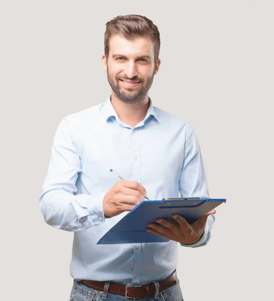 Jonge Knappe Man Blauwe Shirt Met Bestanden Kabinet Tevreden Gelukkig — Stockfoto