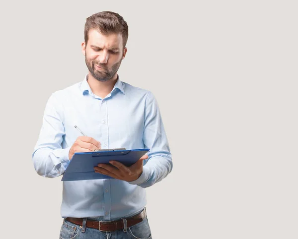 Jonge Knappe Man Blauw Shirt Met Bestanden Kast Verward Twijfel — Stockfoto