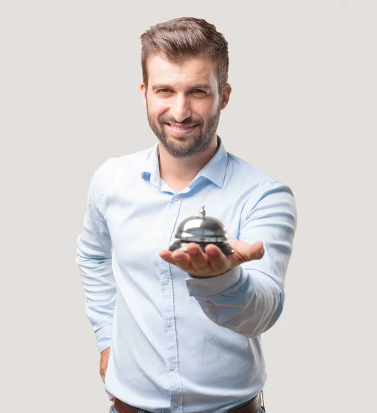 Young Handsome Man Blue Shirt Holding Ring Bell Happy Smiling — Stock Photo, Image