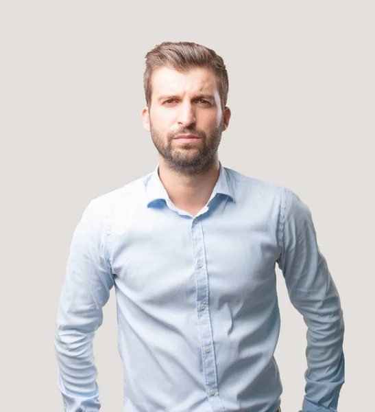 Jovem Bonito Homem Confuso Vestindo Camisa Azul Pessoa Isolada Contra — Fotografia de Stock