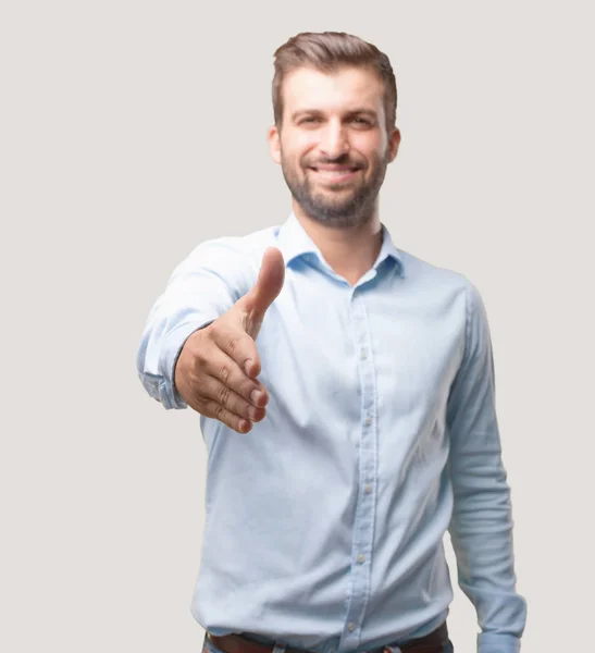 Young Handsome Man Shake Hand Greet Gesture Wearing Blue Shirt — Stock Photo, Image