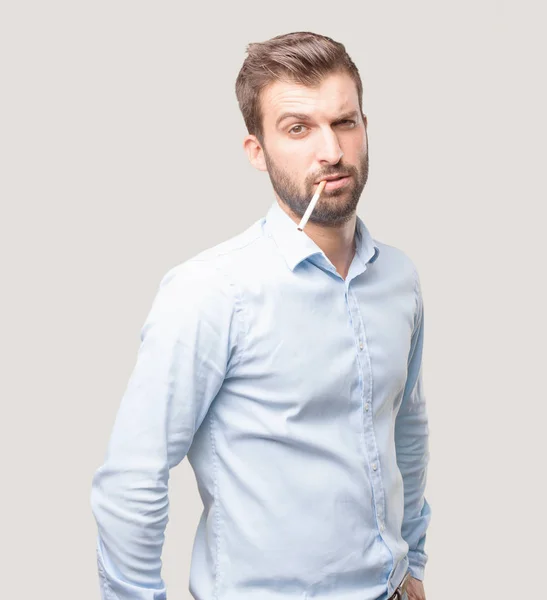 Junger Gutaussehender Mann Zigarette Rauchend Blaues Shirt Person Isoliert Vor — Stockfoto