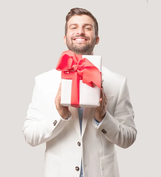 Young Handsome Businessman Gift Box White Blazer Surprised Happy Expression — Stock Photo, Image