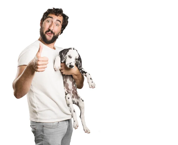 Jovem Legal Feliz Homem Segurando Cachorrinho Dalmatian — Fotografia de Stock