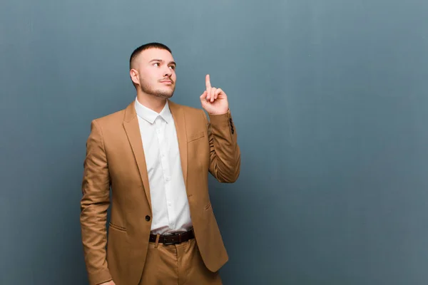 Young Handsome Businessman Feeling Genius Holding Finger Proudly Air Realizing — Stock Photo, Image