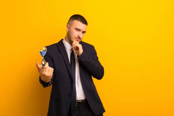 Young Handsome Businessman Flat Background Sand Clock Timer — Stock Photo, Image