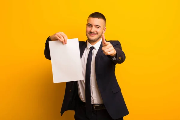 Young Handsome Businessman Flat Background Holding Empty Piece Paper — Stock Photo, Image