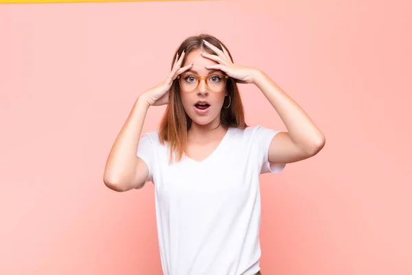 Young Red Head Woman Feeling Horrified Shocked Raising Hands Head — Stock Photo, Image