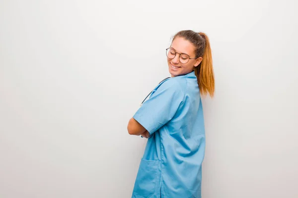 Young Latin Nurse Smiling Gleefully Feeling Happy Satisfied Relaxed Crossed — ストック写真