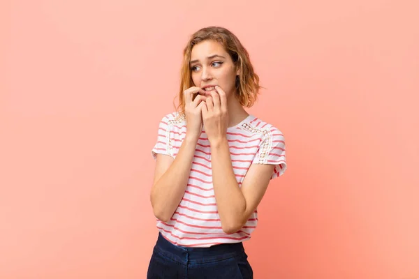 Young Blonde Woman Looking Worried Anxious Stressed Afraid Biting Fingernails — 스톡 사진