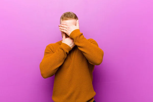 Young Blonde Man Wearing Jumper Covering Face Both Hands Saying — 스톡 사진