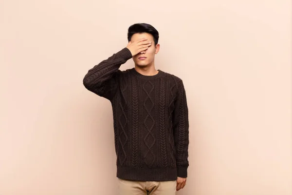 Young Chinese Man Covering Eyes One Hand Feeling Scared Anxious — ストック写真