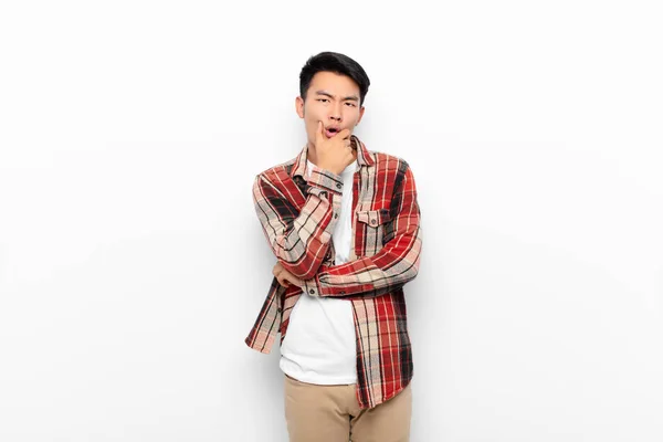 Young Chinese Man Mouth Eyes Wide Open Hand Chin Feeling — Stock Photo, Image