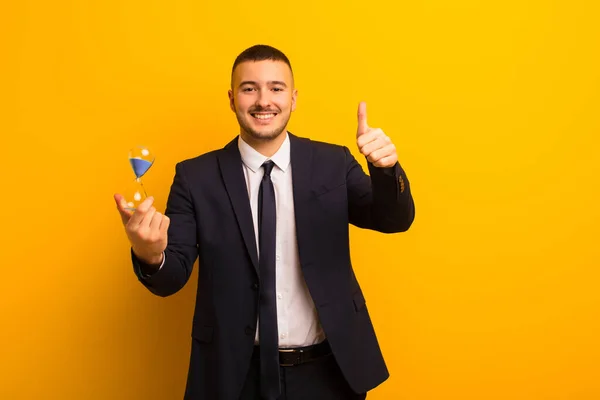 Young Handsome Businessman Flat Background Sand Clock Timer — Stock Photo, Image