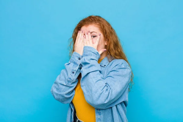 Young Red Head Woman Covering Face Hands Peeking Fingers Surprised — Stock Photo, Image
