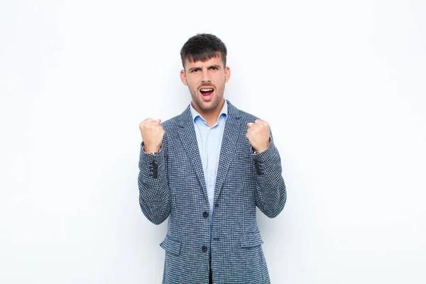 Young Handsome Man Shouting Aggressively Angry Expression Fists Clenched Celebrating — Stock Photo, Image