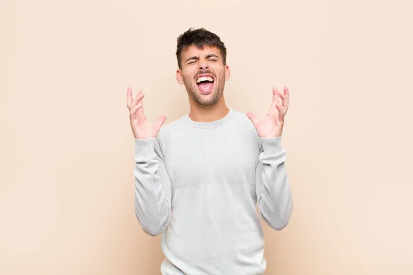 Young Handsome Man Furiously Screaming Feeling Stressed Annoyed Hands Air — Stock Photo, Image