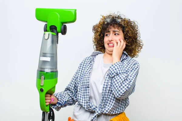 Housekeeper pretty woman with a vaccum cleaner — 스톡 사진