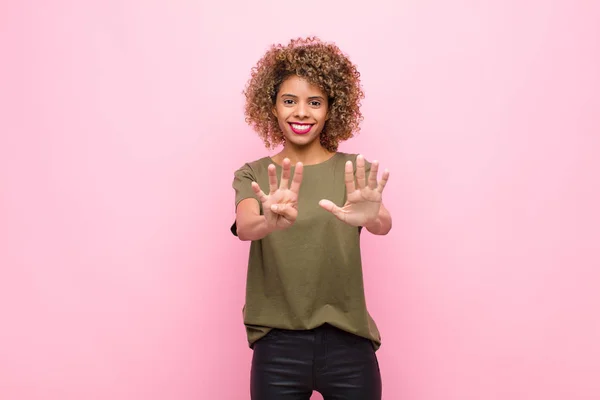 Young African American Woman Smiling Looking Friendly Showing Number Nine — 스톡 사진