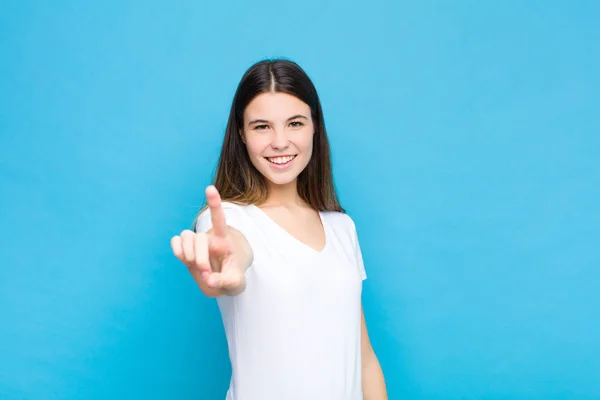 Young Pretty Woman Smiling Proudly Confidently Making Number One Pose — Stock Photo, Image