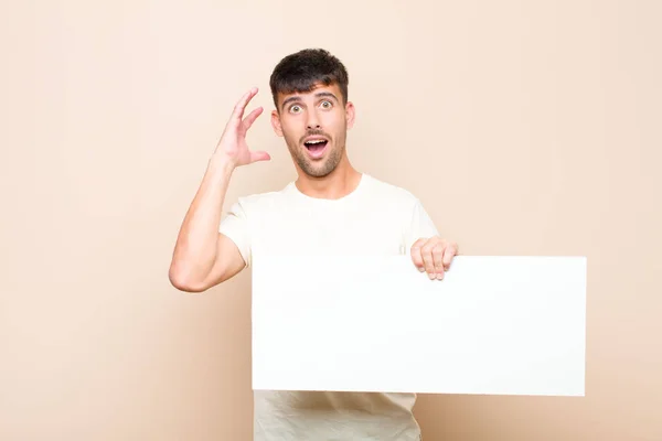 Young Handsome Man Screaming Hands Air Feeling Furious Frustrated Stressed — Stockfoto