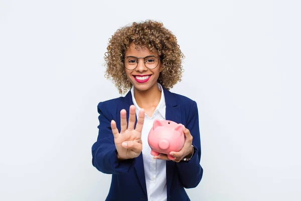 Young African American Woman Smiling Looking Friendly Showing Number Four — 스톡 사진