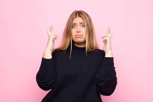 Young Blonde Woman Crossing Fingers Anxiously Hoping Good Luck Worried — Stock Photo, Image