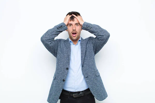 Young Handsome Man Feeling Horrified Shocked Raising Hands Head Panicking — ストック写真