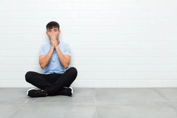 Young Handsome Man Feeling Worried Upset Scared Covering Mouth Hands — Stok fotoğraf