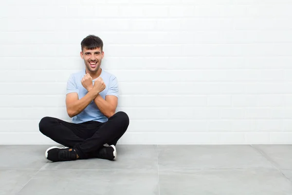 Young Handsome Man Smiling Cheerfully Celebrating Fists Clenched Arms Crossed — Stock Photo, Image