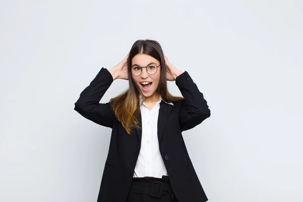 Young Businesswoman Raising Hands Head Open Mouthed Feeling Extremely Lucky — 스톡 사진