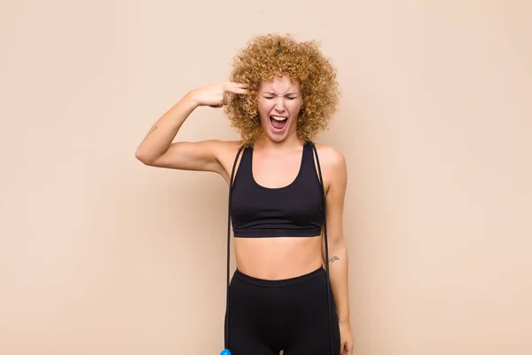 Joven Afro Mujer Buscando Infeliz Estresado Gesto Suicida Haciendo Signo —  Fotos de Stock