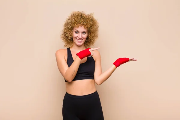 Young Afro Woman Smiling Cheerfully Pointing Copy Space Palm Side — Stock Photo, Image