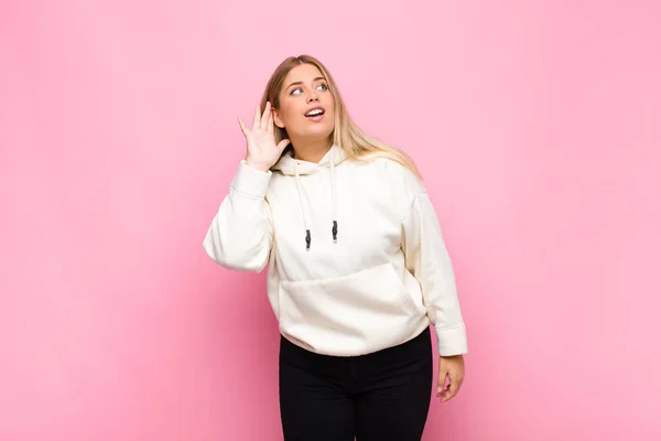 Young Blonde Woman Smiling Looking Curiously Side Trying Listen Gossip — Stock Photo, Image