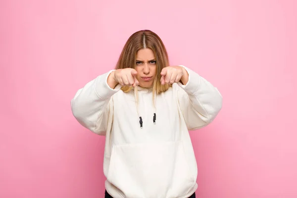 Young Blonde Woman Pointing Forward Camera Both Fingers Angry Expression — Stock Photo, Image