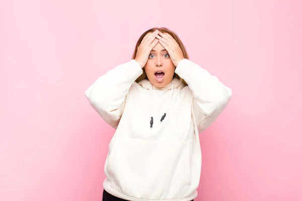 Young Blonde Woman Feeling Horrified Shocked Raising Hands Head Panicking — ストック写真