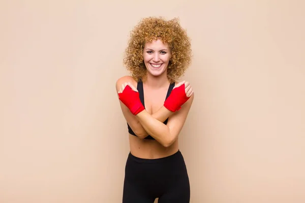 Young Afro Woman Smiling Cheerfully Celebrating Fists Clenched Arms Crossed — Stock Photo, Image