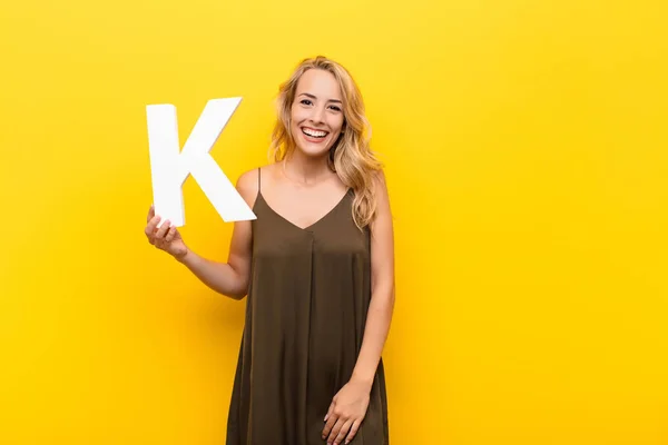 Young Blonde Woman Excited Happy Joyful Holding Letter Alphabet Form — Stock Photo, Image