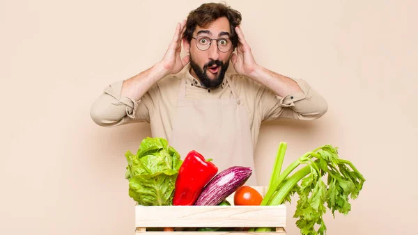 Green Grocery Man Looking Excited Surprised Open Mouthed Both Hands — Stock Photo, Image