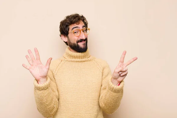 Young Cool Man Smiling Looking Friendly Showing Number Seven Seventh — Stock Photo, Image