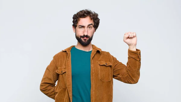 Young Handsome Man Feeling Serious Strong Rebellious Raising Fist Protesting — Stock Photo, Image