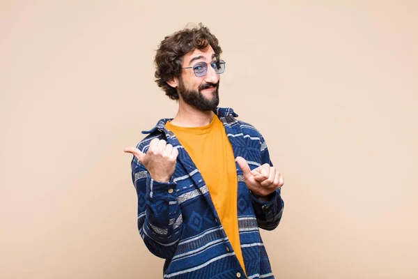 Young Crazy Cool Man Smiling Cheerfully Casually Pointing Copy Space — Stock Photo, Image