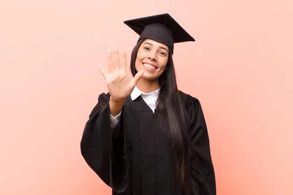 Young Latin Woman Student Smiling Looking Friendly Showing Number Five — Stock Photo, Image