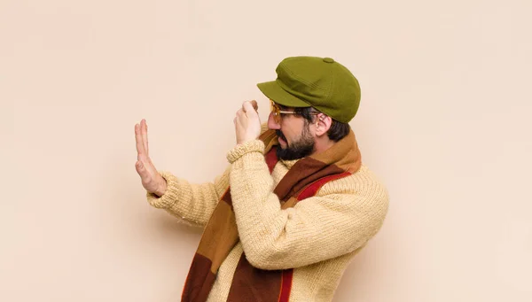 Young Cool Bearded Man Covering Face Hand Putting Other Hand — Stock Photo, Image