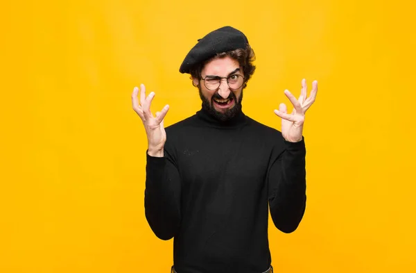 Young French Artist Man Screaming Hands Air Feeling Furious Frustrated — Stock Photo, Image