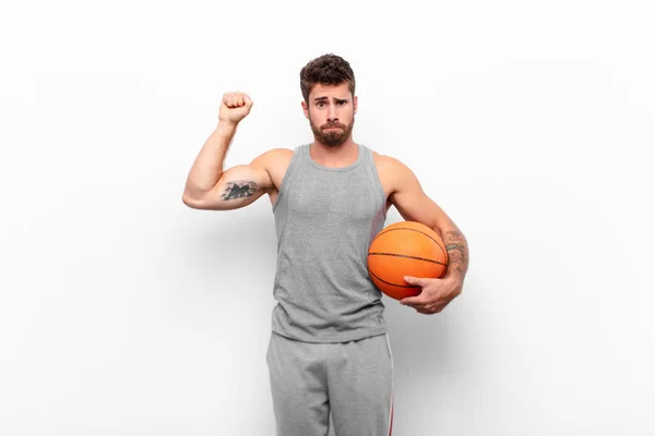 Young Handsome Man Feeling Serious Strong Rebellious Raising Fist Protesting — Stock Photo, Image