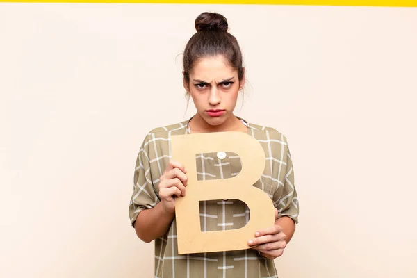 Young Pretty Woman Angry Anger Disagreement Holding Letter Alphabet Form — Stock Photo, Image