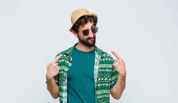 Young Tourist Man Bad Attitude Looking Proud Aggressive Pointing Upwards — Stock Photo, Image