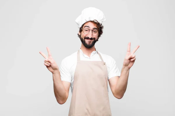 Young Crazy Chef Smiling Looking Happy Friendly Satisfied Gesturing Victory — Stock Photo, Image