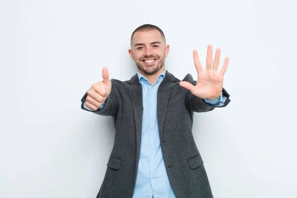 Young Businessman Smiling Looking Friendly Showing Number Six Sixth Hand — Stock Photo, Image